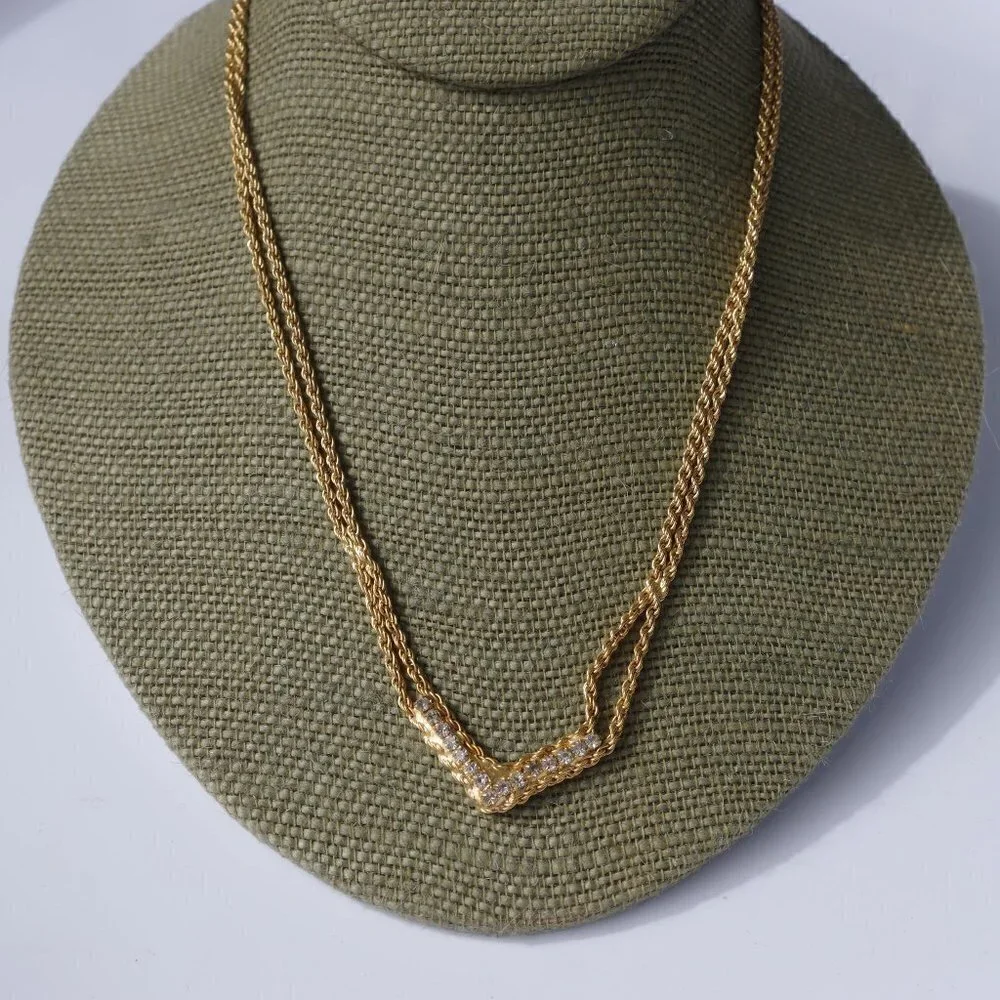 Women`s gold tone crystal double rope necklace.